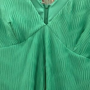 Green long dress, very comfortable.